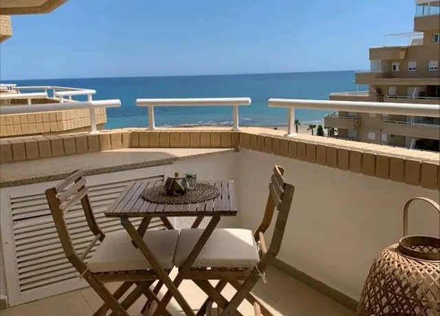 Outdoor table for breakfast by the sea