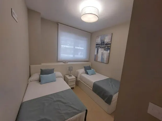 Dormitorio con dos camas